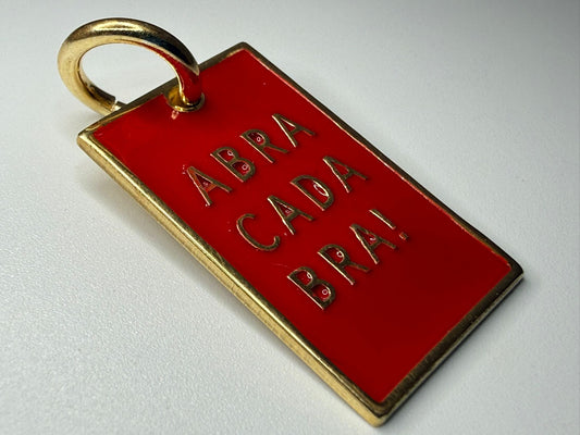 Amuleto magico Abracadabra! Rosso - argento dorato