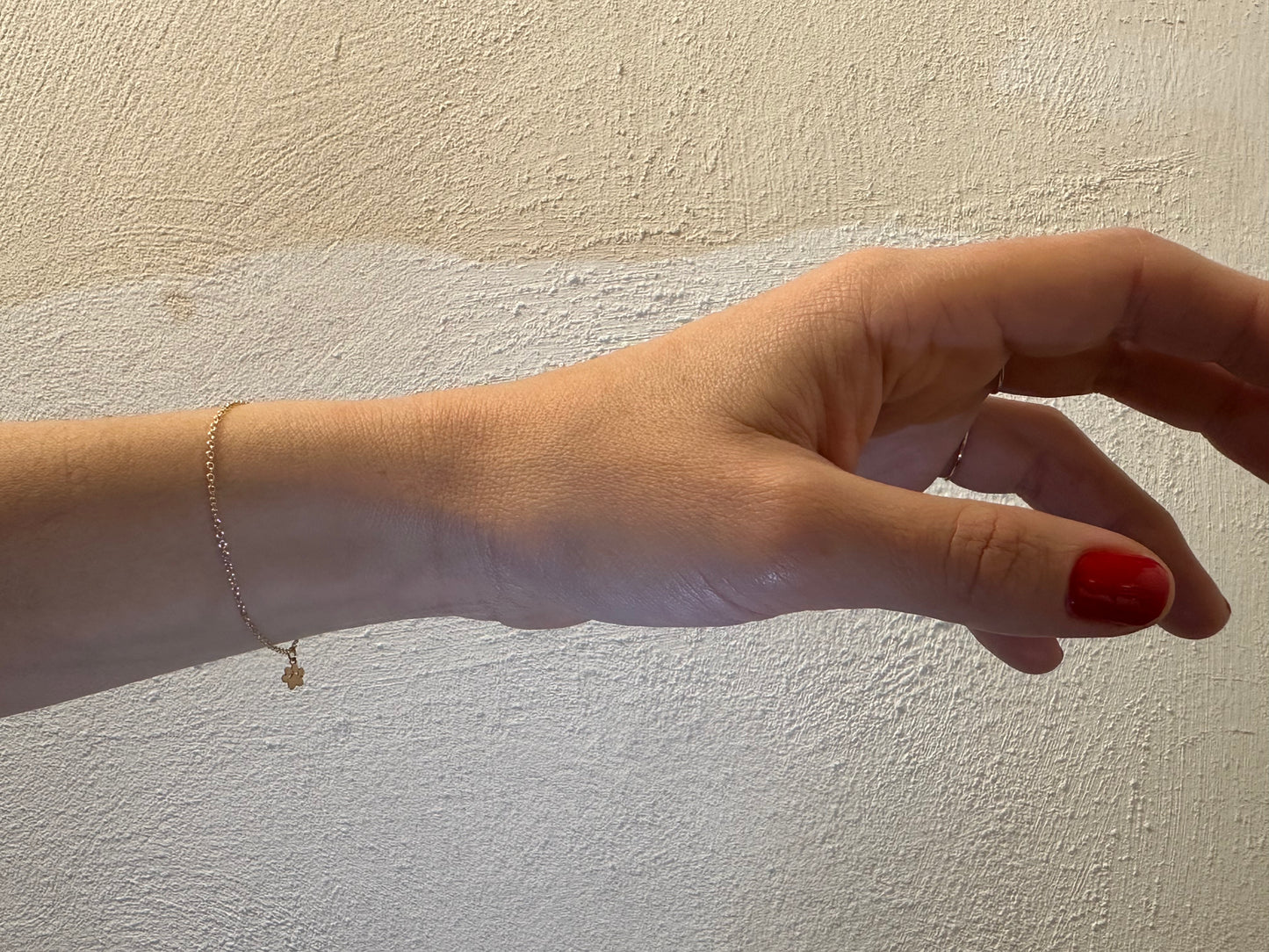 PERSEMPRE I Ciondolo zampetta oro giallo 18kt